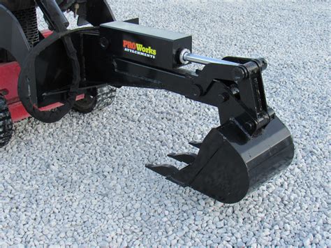 mini skid steer backhoe attachment|mini skid steer boring attachment.